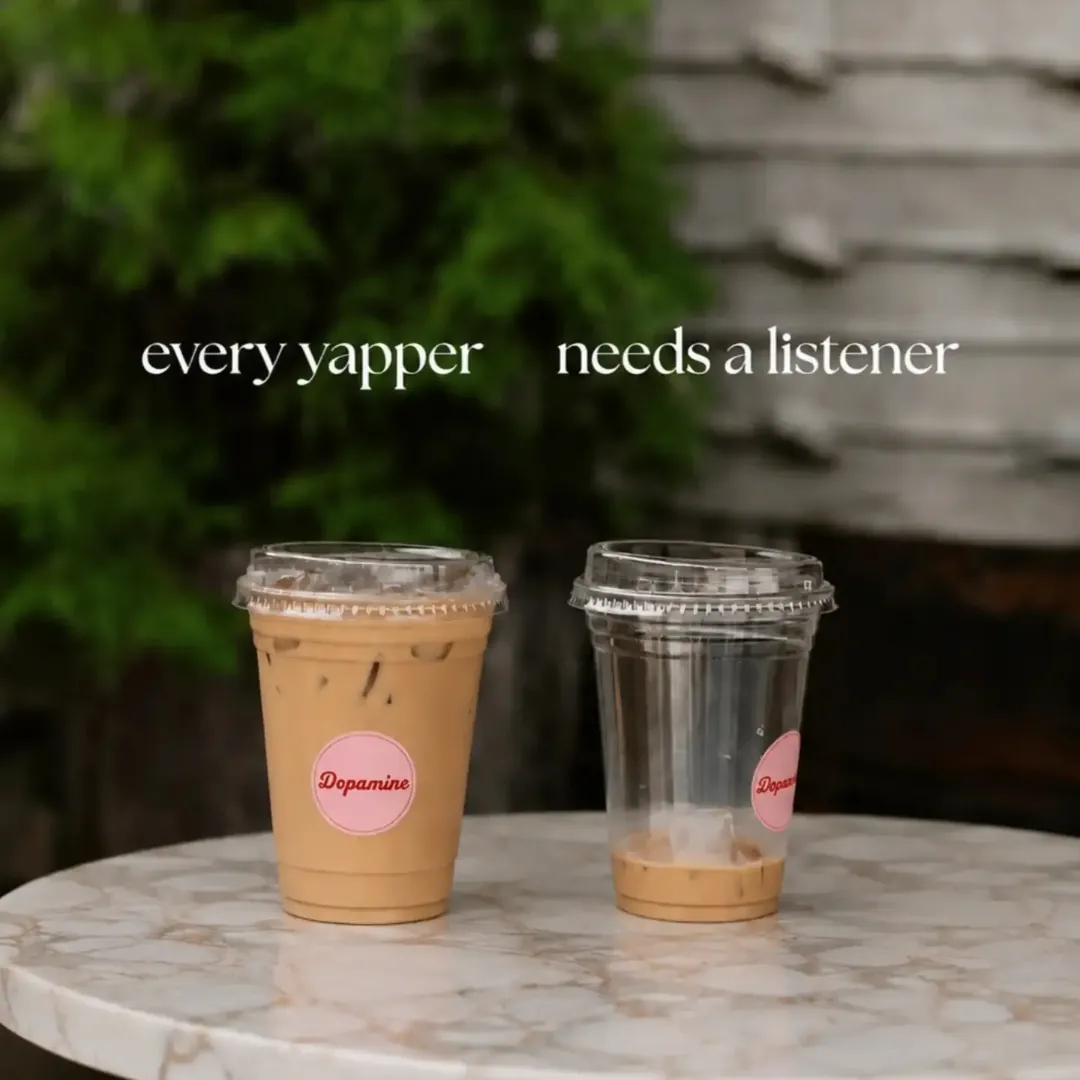 two iced coffees on a marble table outside: every yapper needs a listener